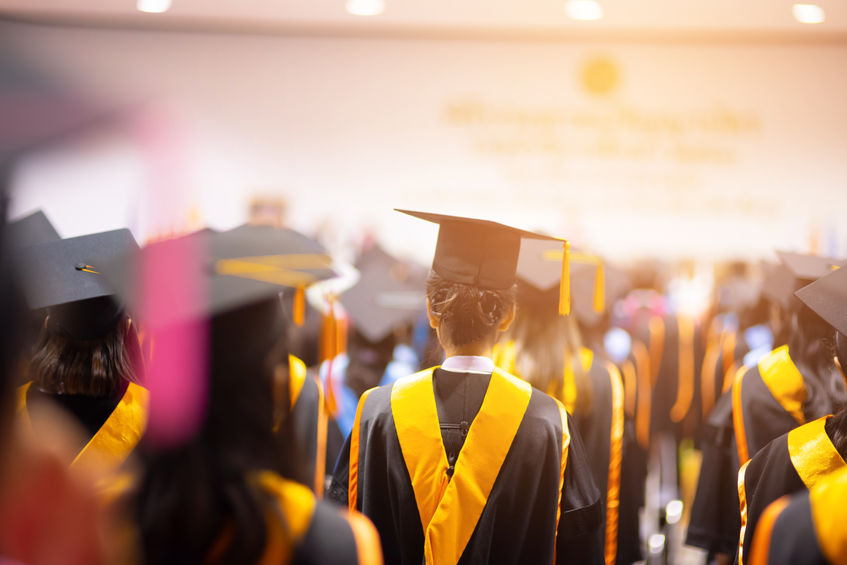 students graduating from college