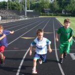 kids running on track