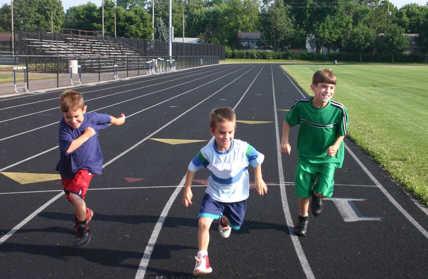 kids running on track