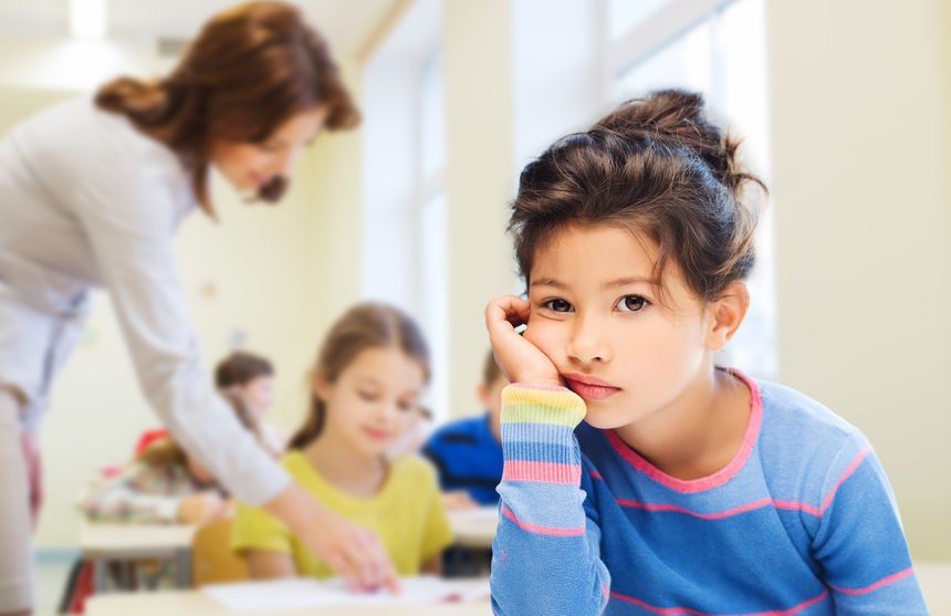 young girl bored at school